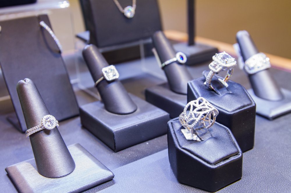 A display case showcasing elegant engagement ring designs.