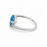 White Gold Blue Topaz & Diamond Bypass Ring