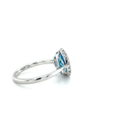 14KW Blue Topaz & Diamond Halo Ring