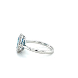 14KW Blue Topaz & Diamond Halo Ring